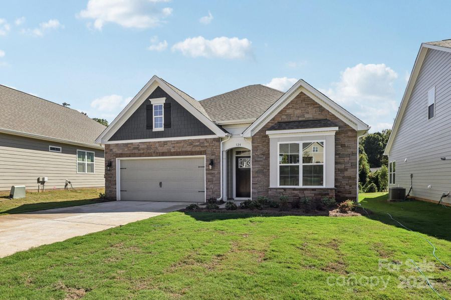Exterior details and patio area of a home in Brookside, Troutman (Image 23).