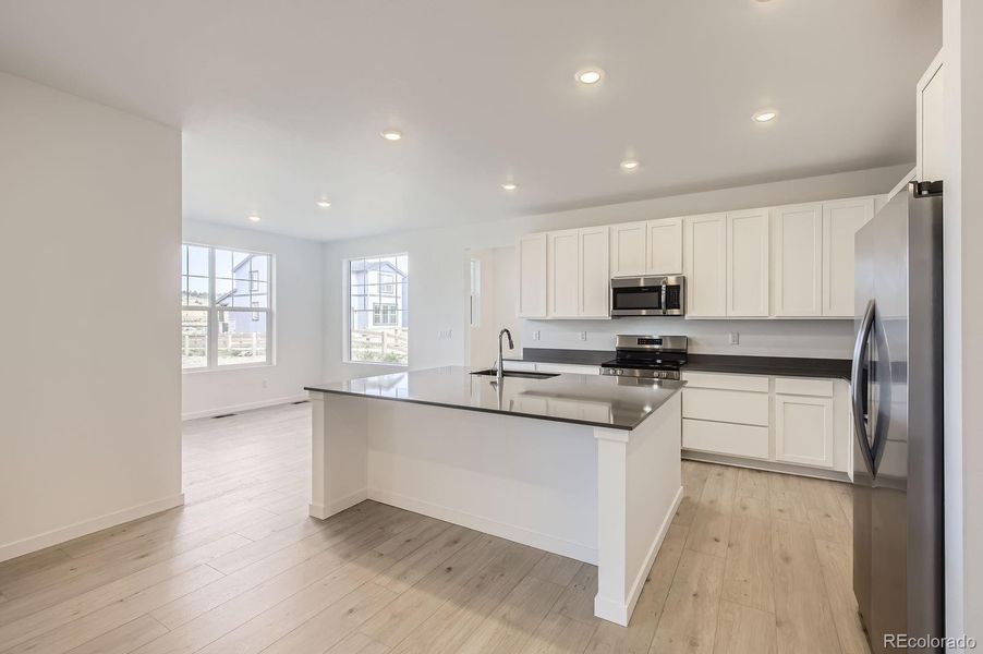 Furnished interior view inside a new home in Riano Ridge: The Monarch Collection, Loveland (Image 7).