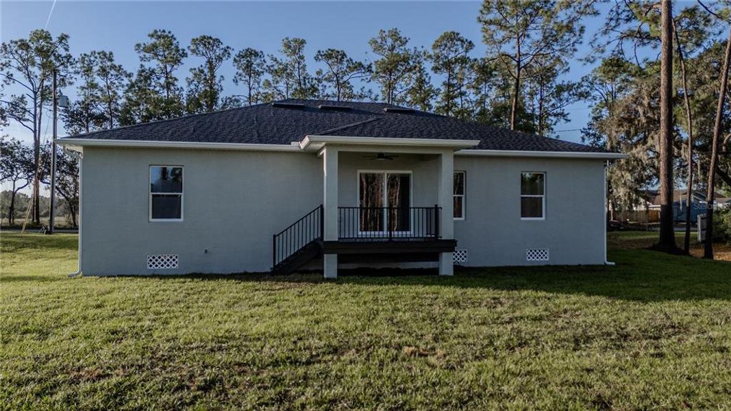 Front exterior of a new home in , Deltona, FL, highlighting curb appeal (Image 16).