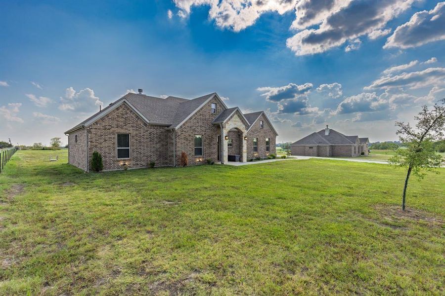 Front exterior of a new home in , Leonard, TX, highlighting curb appeal (Image 19).