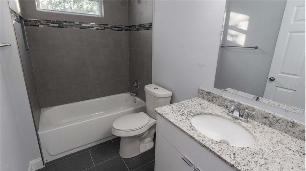 Furnished interior view inside a new home in , Dunnellon (Image 9).