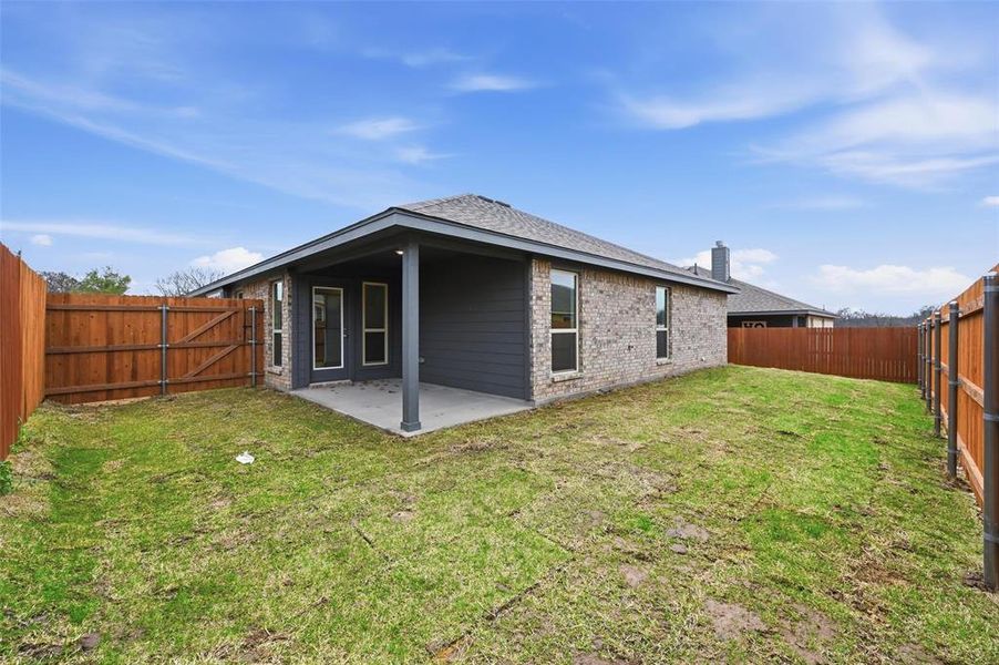 Exterior details and patio area of a home in Trail Creek, Cleburne (Image 23). Exterior details and patio area of a home in Trail Creek, Cleburne (Image 23).