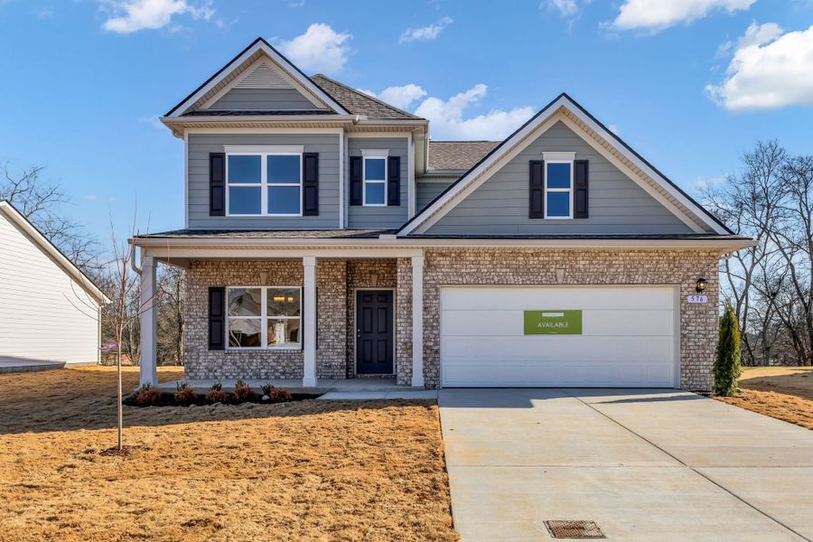 Front exterior of a new home in Hampshire Hills, Columbia, TN, highlighting curb appeal (Image 1). Front exterior of a new home in Hampshire Hills, Columbia, TN, highlighting curb appeal (Image 1).