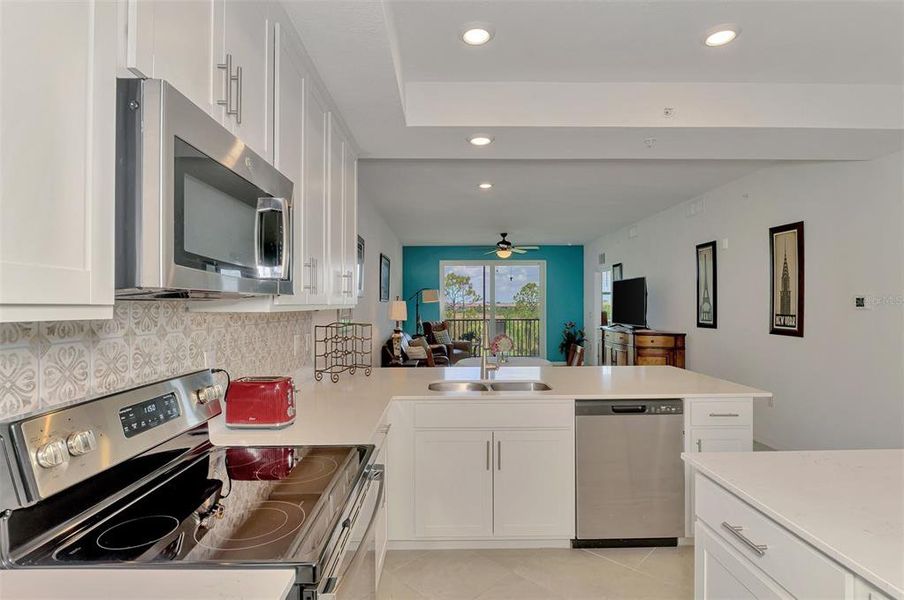 Furnished interior view inside a new home in Wellen Park Golf & Country Club, Venice (Image 17).