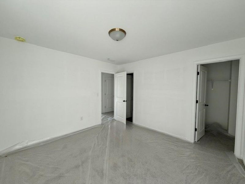 Spacious, unfurnished interior of a new home in Arbors at Richland Creek, Buford (Image 7).