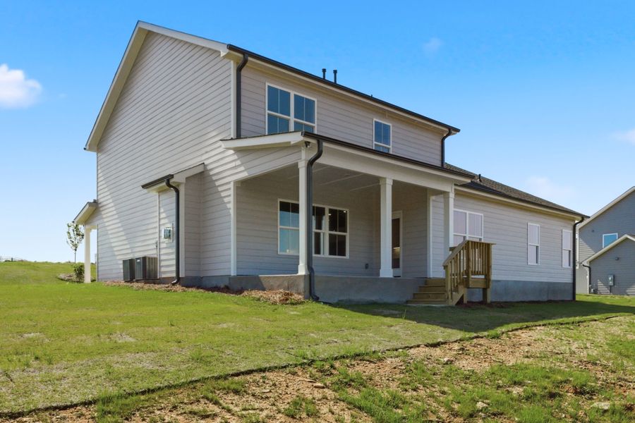 Exterior details and patio area of a home in Cherokee Knoll, Williamston (Image 4).