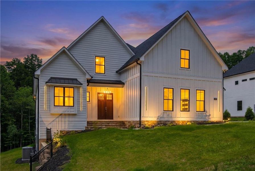 Front exterior of a new home in , Cumming, GA, highlighting curb appeal (Image 26).