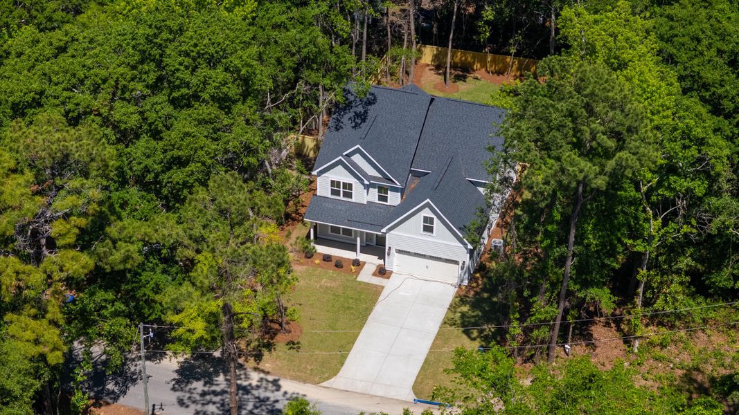 Front exterior of a new home in , Mount Pleasant, SC, highlighting curb appeal (Image 2). Front exterior of a new home in , Mount Pleasant, SC, highlighting curb appeal (Image 2).