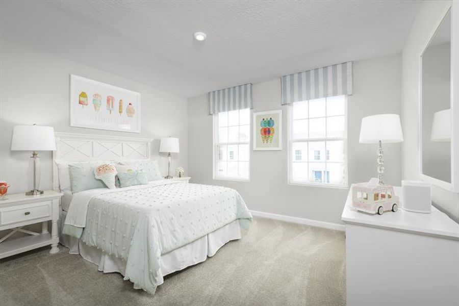 Representative furnished interior of a home built from the Neptune End Home by Ryan Homes in Waverly at Wylder, Port St. Lucie (Image 9).