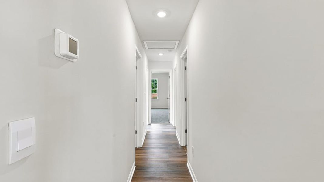 Spacious, unfurnished interior of a new home in Village 3, Woodruff (Image 19). Spacious, unfurnished interior of a new home in Village 3, Woodruff (Image 19).