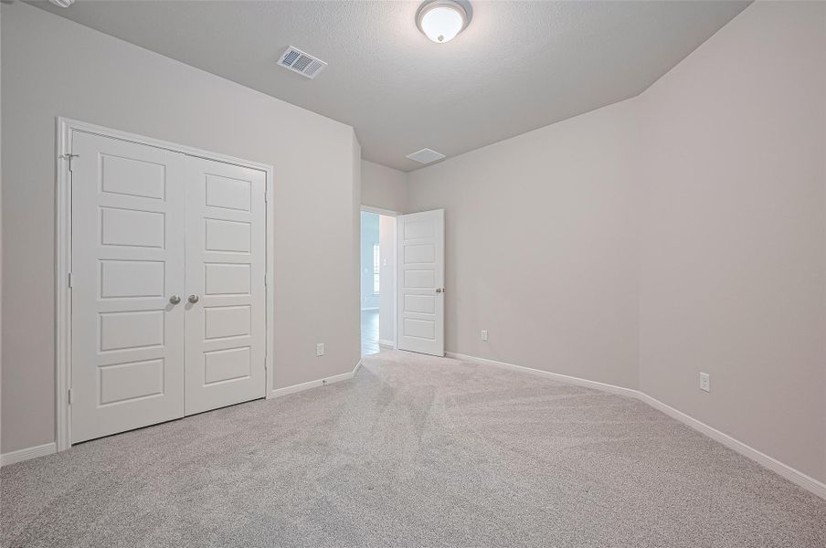 Spacious, unfurnished interior of a new home in Sunterra, Katy (Image 34).