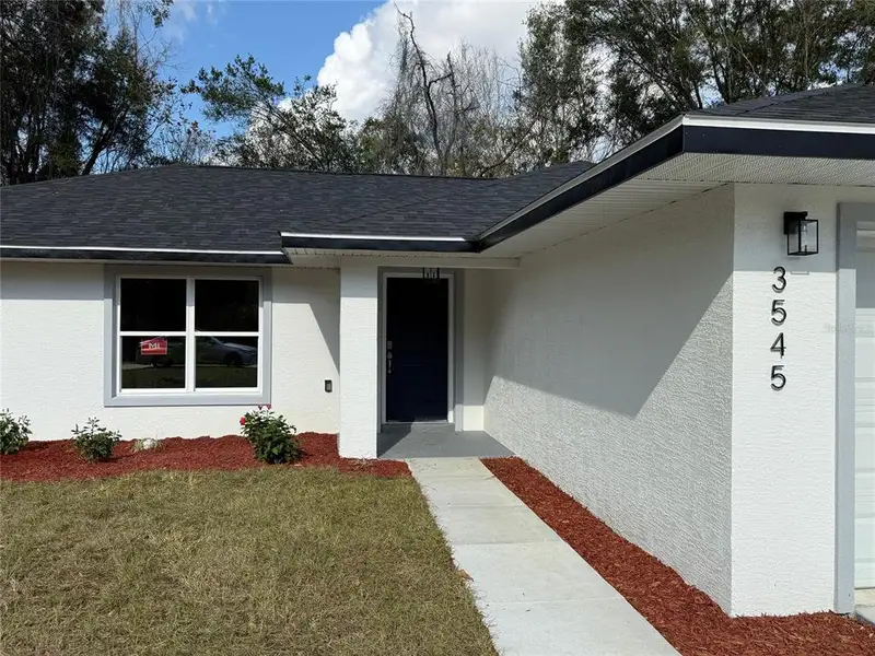 Exterior details and patio area of a home in , Summerfield (Image 4).