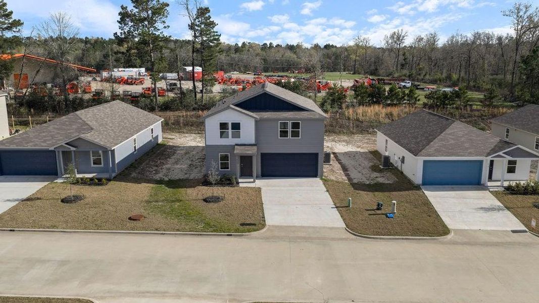 Front exterior of a new home in Shirey Forest - Branches, Lufkin, TX, highlighting curb appeal (Image 15).