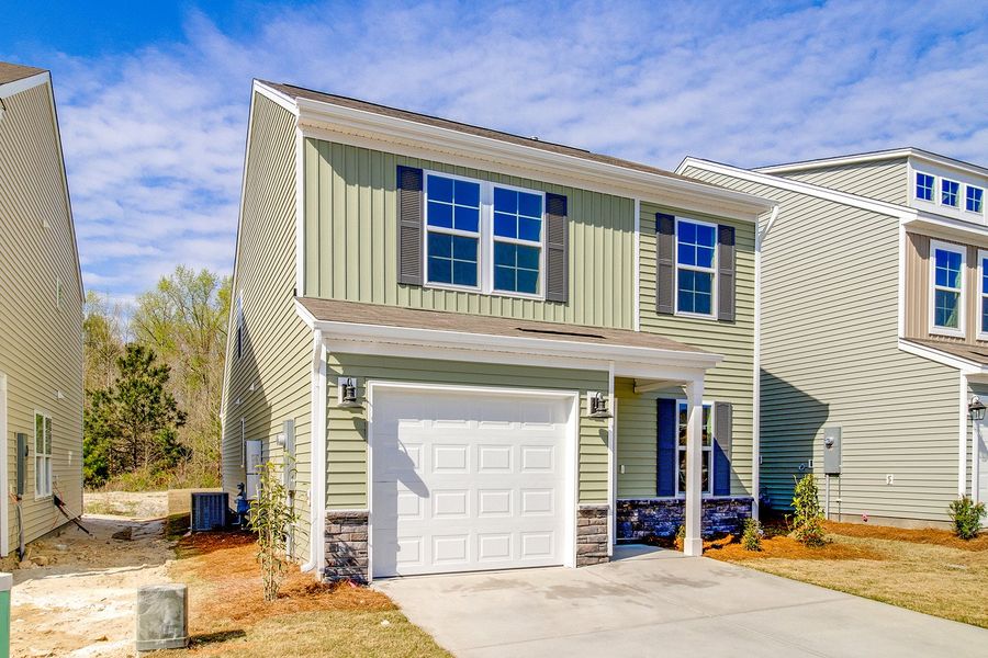 Front exterior of a new home in Bluefield, Lexington, SC, highlighting curb appeal (Image 20).
