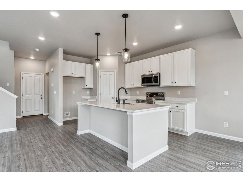 Furnished interior view inside a new home in Parkway at Prairie Center Village, Brighton (Image 4).