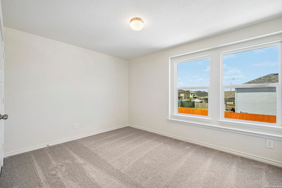Spacious, unfurnished interior of a new home in Woodside Farms, Seguin (Image 22).