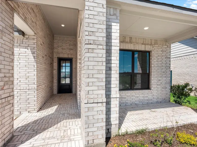 Exterior details and patio area of a home in Austin Point, Richmond (Image 4).