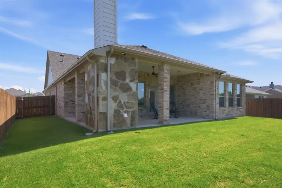 Exterior details and patio area of a home in , Burleson (Image 4).