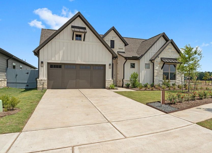 Front exterior of a new home in , Fulshear, TX, highlighting curb appeal (Image 23). Front exterior of a new home in , Fulshear, TX, highlighting curb appeal (Image 23).