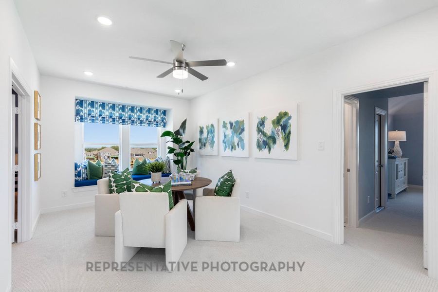 Carpeted dining room featuring recessed lighting and ceiling fan
