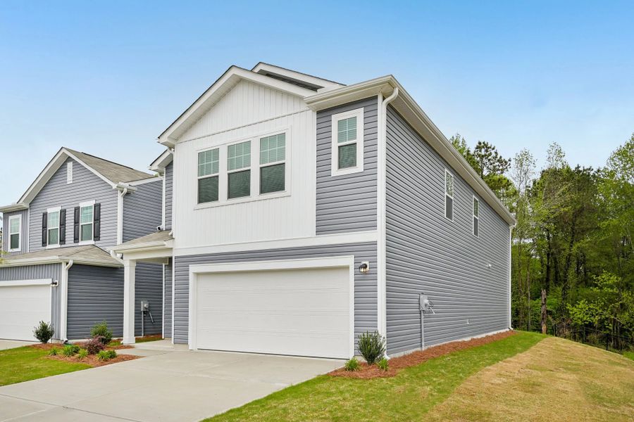 Representative exterior photo of a completed home built from the Apollo by Starlight Homes in The Point, Rolesville, NC (Image 26).