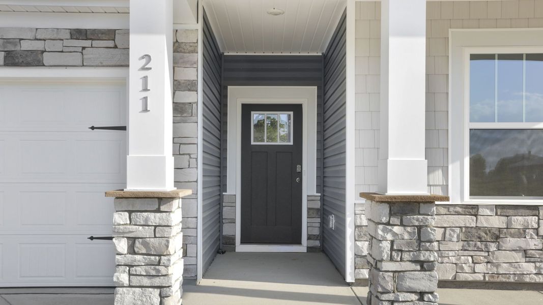 Exterior details and patio area of a home in Pine Lake Estates, Anderson (Image 3).