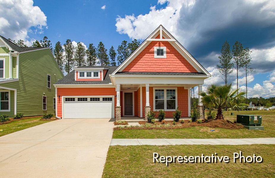 Front exterior of a new home in , Ravenel, SC, highlighting curb appeal (Image 2).