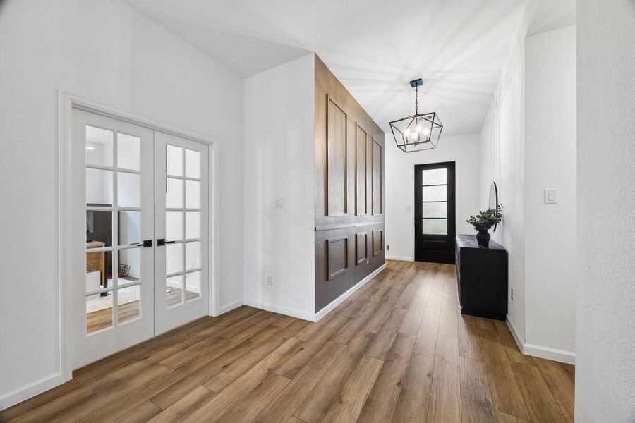 Another view of the entry and study with French doors. Another view of the entry and study with French doors.