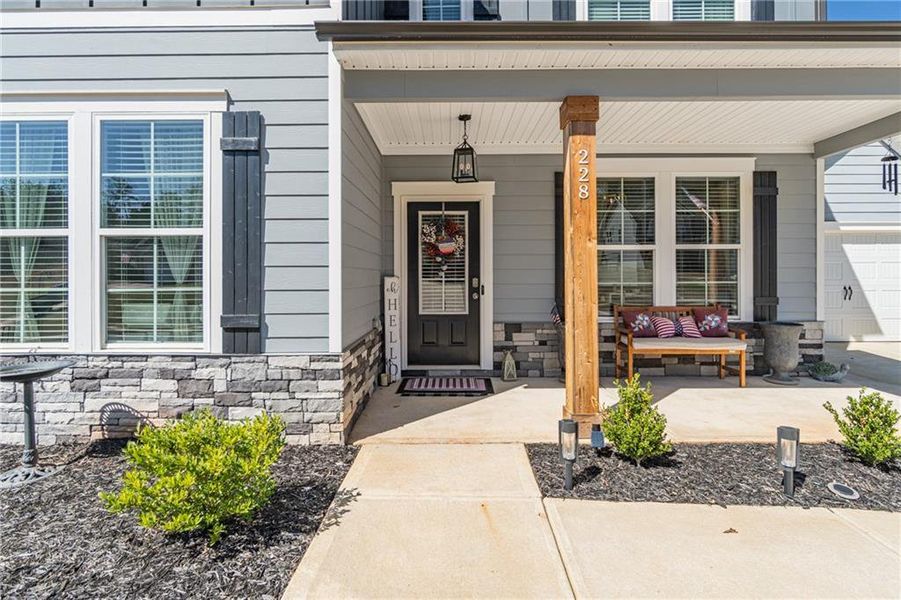Exterior details and patio area of a home in River Station, Monroe (Image 28).