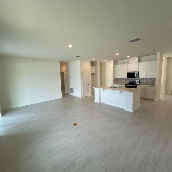 Spacious, unfurnished interior of a new home in Palm Coast: Cornerstone Collection, Palm Coast (Image 14).