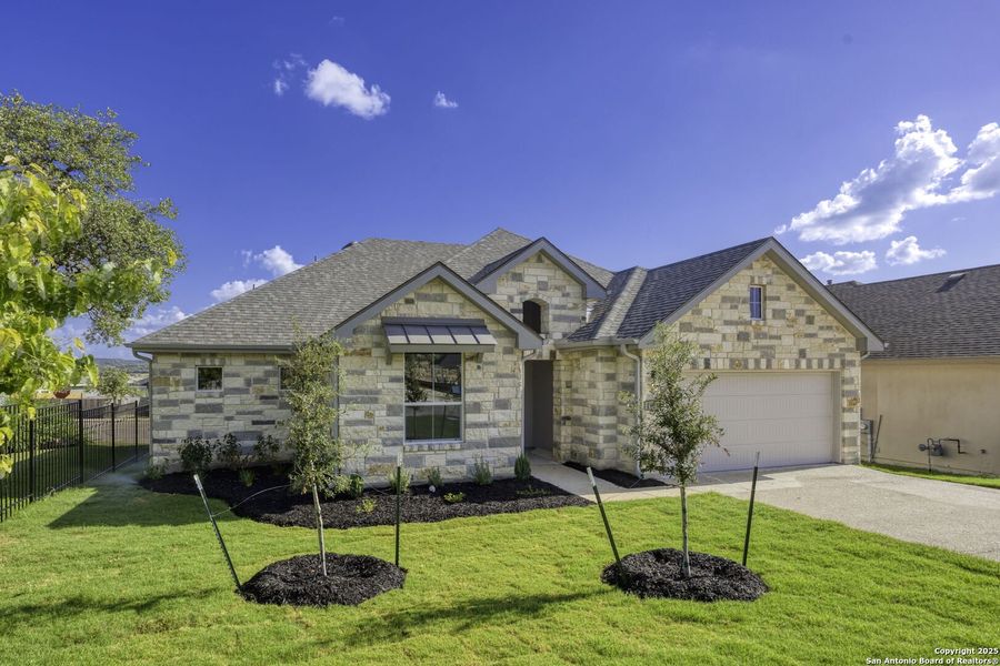 Front exterior of a new home in , Kerrville, TX, highlighting curb appeal (Image 20).
