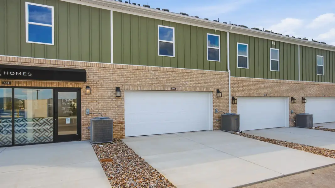 Rear exterior of home and garage