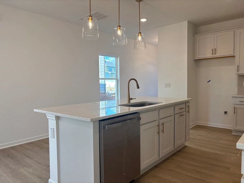 Kitchen featuring the AW Collection® Serene - Clean lines and earthy textures define the space.