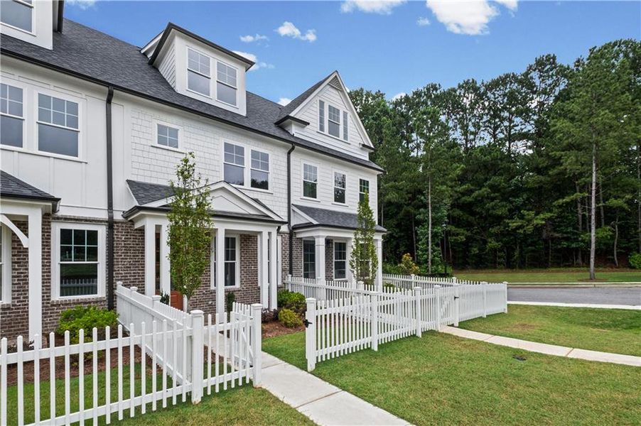 Front exterior of a new home in , Canton, GA, highlighting curb appeal (Image 19).