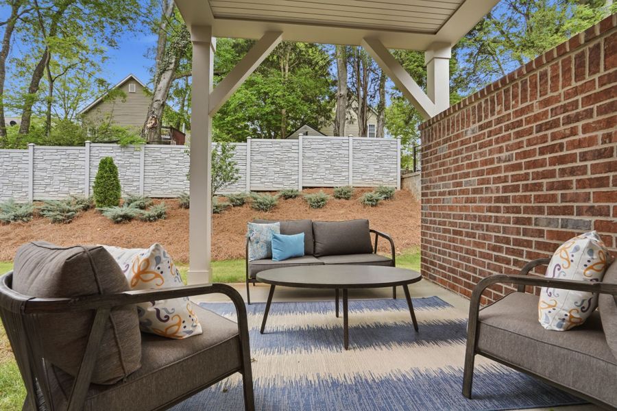 Exterior details and patio area of a home in The Townes at Wade Ardrey, Charlotte (Image 25). Exterior details and patio area of a home in The Townes at Wade Ardrey, Charlotte (Image 25).