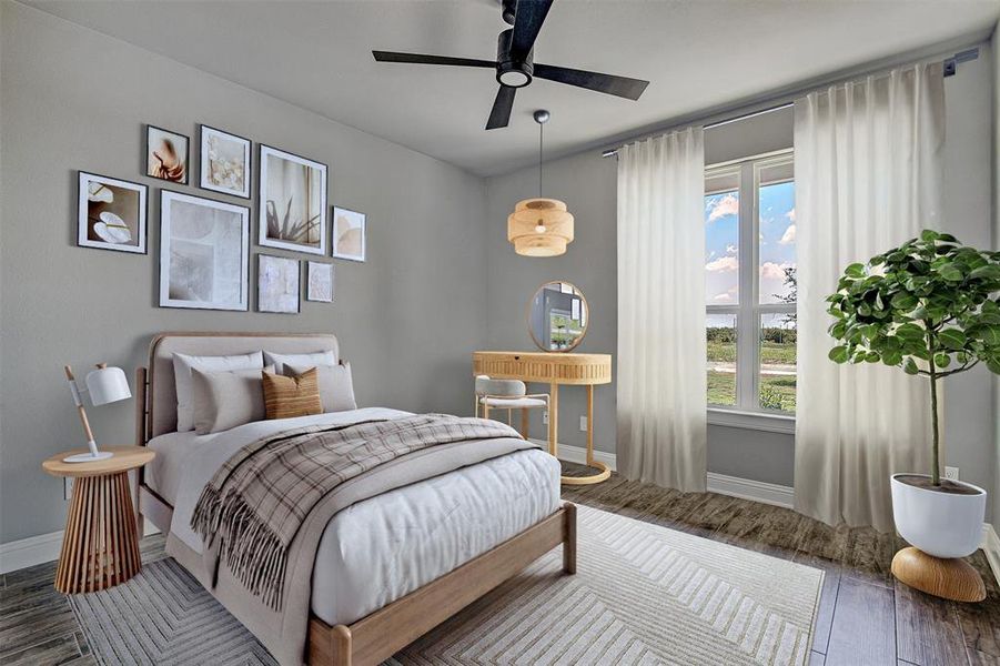 Bedroom with ceiling fan and dark hardwood / wood-style floors