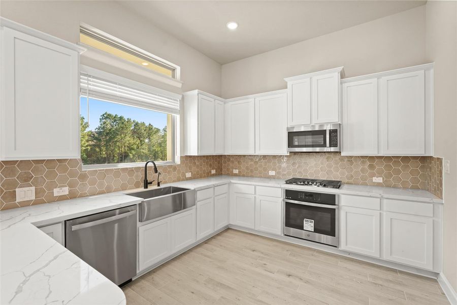Furnished interior view inside a new home in Waterstone on Lake Conroe, Montgomery (Image 13).