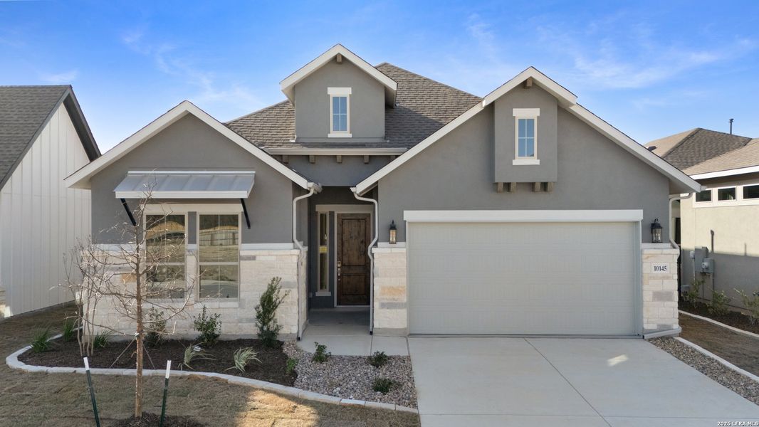 Front exterior of a new home in Davis Ranch, San Antonio, TX, highlighting curb appeal (Image 19).
