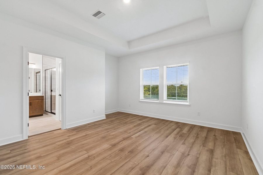 Spacious, unfurnished interior of a new home in Westerly Park at Wildlight - Courtyard Collection, Yulee (Image 27).