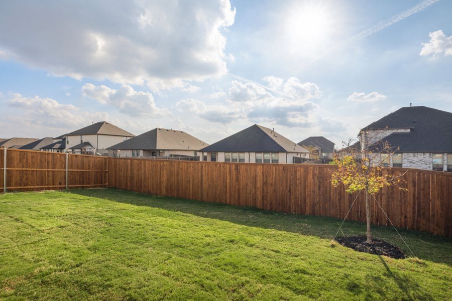 Exterior details and patio area of a home in Walden Pond, Forney (Image 27).