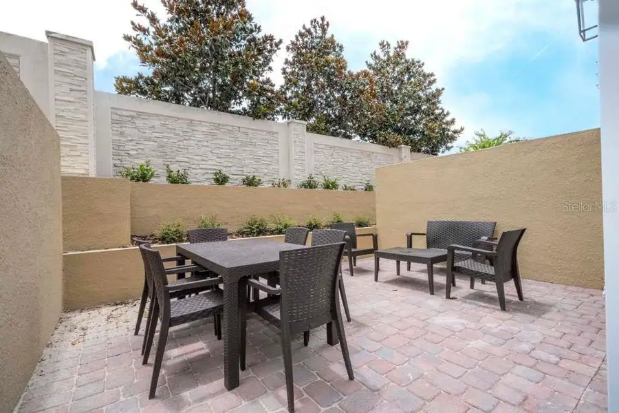 Exterior details and patio area of a home in , Kissimmee (Image 3).