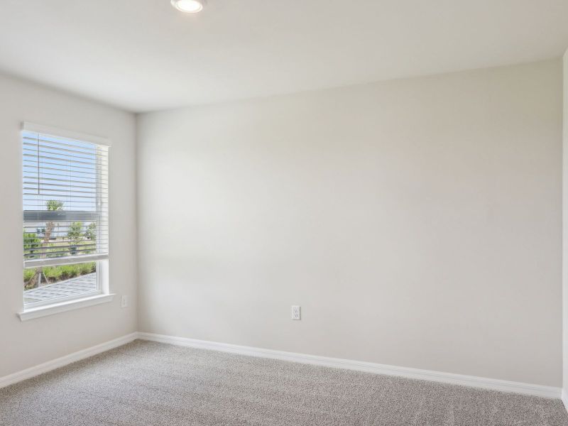 Bedroom in the Ibis floorplan at 44518 Cable Creek Dr