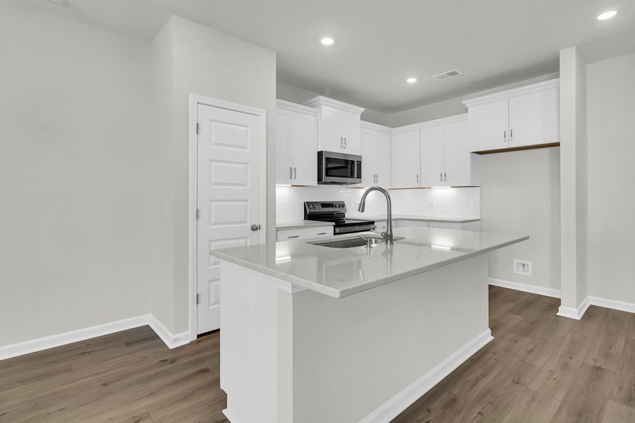 Furnished interior view inside a new home in Six Oaks, Summerville (Image 11).