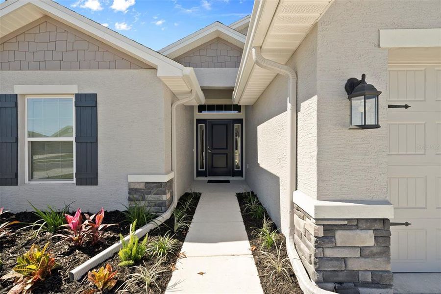 Exterior details and patio area of a home in Pine Bluff, Spring Hill (Image 3).