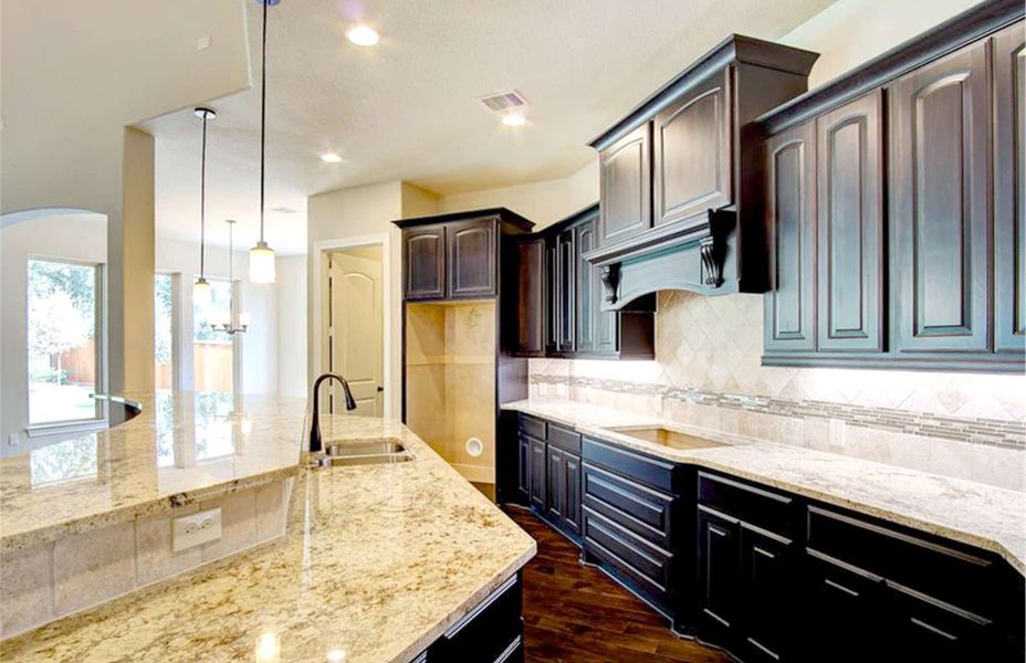 Representative furnished interior of a home built from the 4198 by Ravenna Homes in The Woodlands Hills 65′, Willis (Image 5).