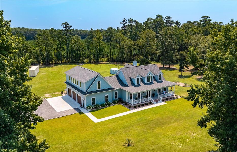 Front exterior of a new home in , Ravenel, SC, highlighting curb appeal (Image 24). Front exterior of a new home in , Ravenel, SC, highlighting curb appeal (Image 24).