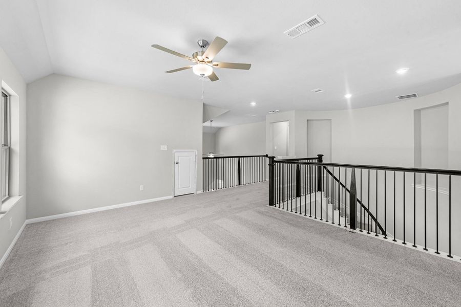 Additional view of the upstairs game room.