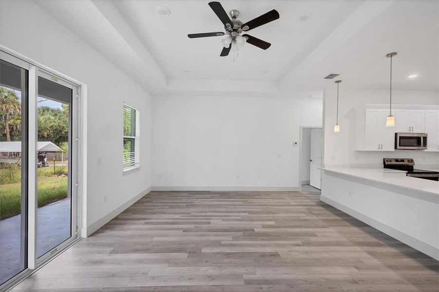 Spacious, unfurnished interior of a new home in , Port Charlotte (Image 24).