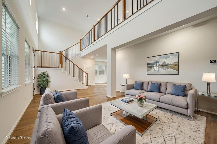 VIRTUALLY STAGED formal living room/flex space.