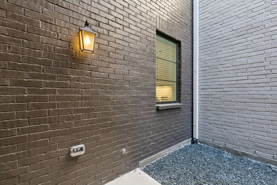 Representative exterior details of a home built from the Roosevelt by Centre Living Homes in Newman Village Townhomes, Frisco (Image 3).